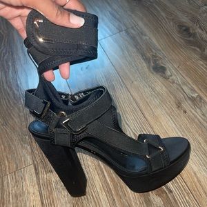 Strappy black pumps